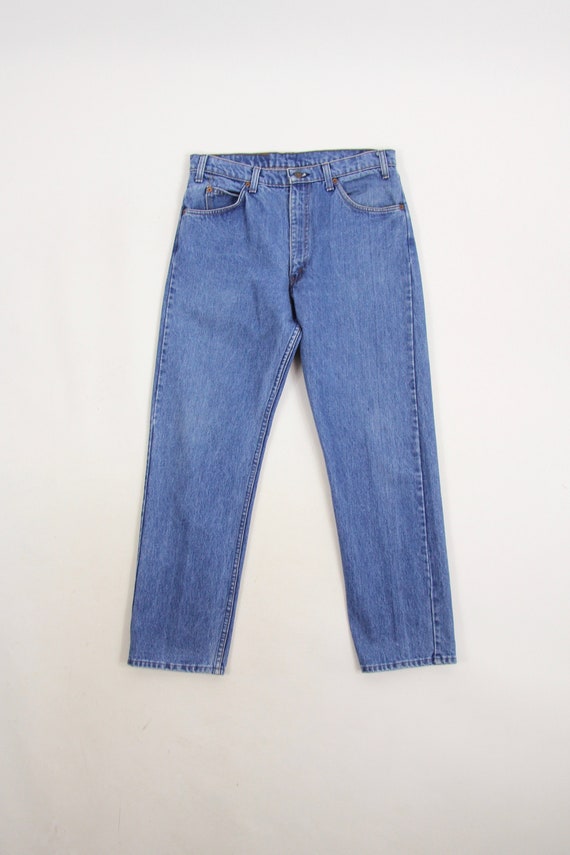 missguided ripped mom jeans