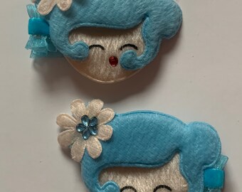 Cute, Kawaii Blue Girls on lined alligator hair clips. Soft materials for face and hair.