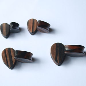 Tear drop plugs , black arang wood hand made, price per pair .