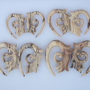 topical  leaves designs ear gauges hand made tamarind wood , light weights price per pair