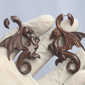 Dragon fake gauges code 3 ,hand made sono wood . with 316 L surgical post. price per pair.