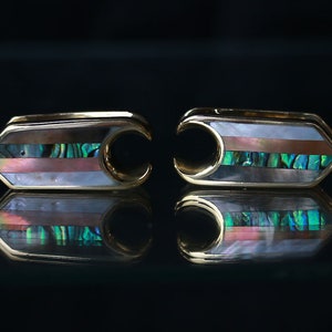 Brass ear saddle code 1 with four shells combinations inlay should have at least 14 mm or 9/16" to wear these, price per pair