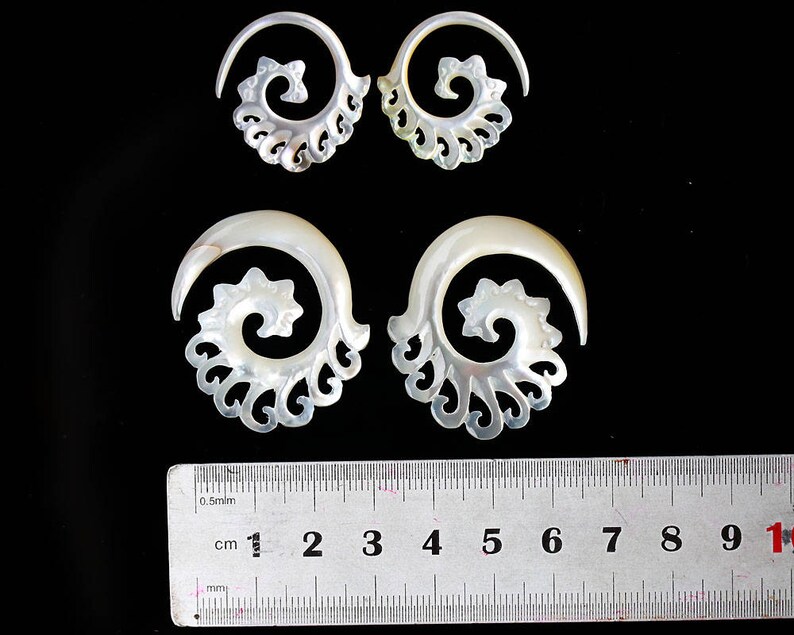 Mother of Pearls hanging styles floral styles .price per pair