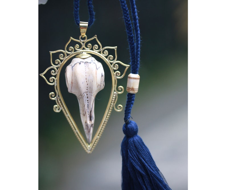 Bids skull and brass pendant hand made tamarind wood exclusive designs by tribal island price per piece. set in brass SALES