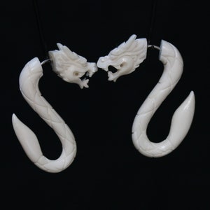 Dragon-Bali style carving, split gauges, fake gauges cow bone hand carved with 316 L surgical post, hypo-allergic  price per pair.