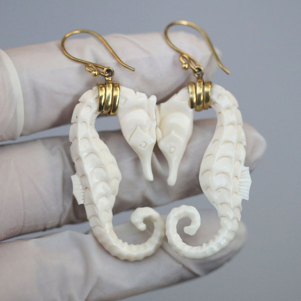 Sea Horse earrings , very detail hand carved cow bone set brass and brass post. price per pair