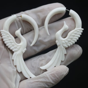 Paradise bird code 2 . split gauges, fake gauges. cow bone hand carved with 316 L surgical post, hypo-allergic  price per pair.