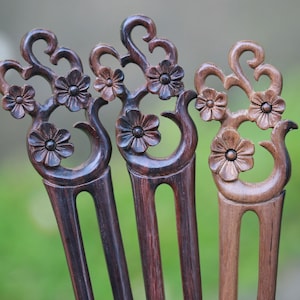 Bellissimo giocattolo per capelli a forma di fiore di ibisco o forato per capelli, realizzato in legno di Sono, intagliato a mano