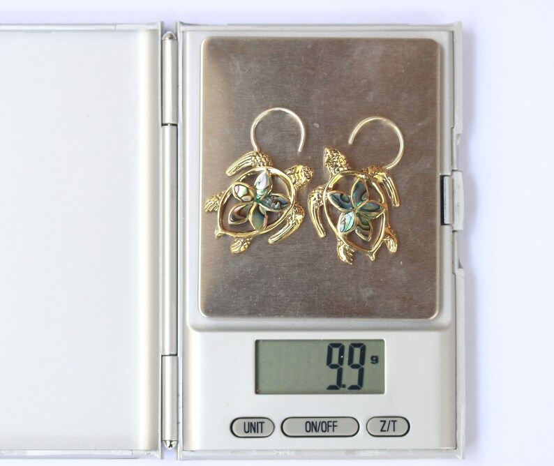 Turtle brass and abalone shell inlay earrings with silver post price per pair.