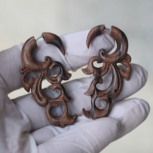 bali floral carving styles split gauges, hand made sono wood ,  and 316 L surgical post, hypoallergenic, hand Made .price per pair