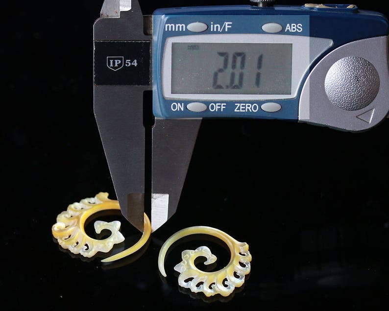 Mother of Pearls hanging styles floral styles .price per pair