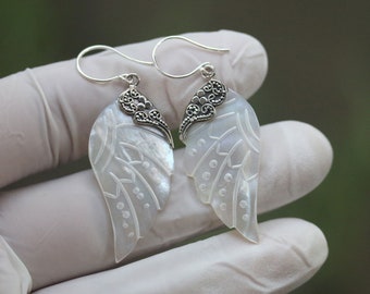 small wings  earrings, hand carved  MOP Shells ,set in silver , price per pair