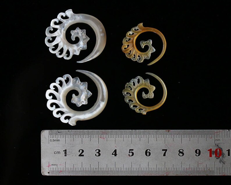 Mother of Pearls hanging styles floral styles .price per pair