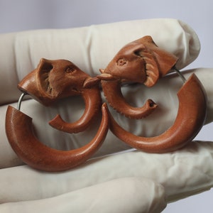 Elephant , fake gauge, fake expander,  hand made saba  wood with  316 L surgical post, hypoallergenic .price per pair