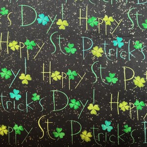 Happy St Patrick’s Dayby Unknown Maker/Quilting Sewing Fabric/Bkack Background/Shamrocks/Green & Gold Letters/Gold Glitter/HALF YARD Pricing