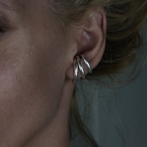 Flow lobe earrings made in solid sterling silver Or 18 k yellow gold plate over silver for pierced ears