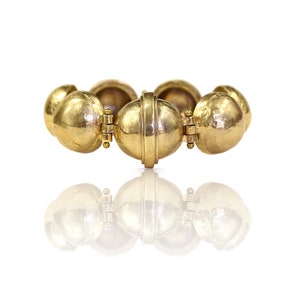 Thethis Gold Hinged Bracelet-made in bronze