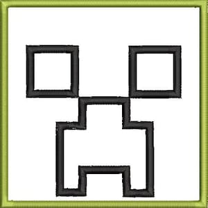 May include: Black embroidered design of a pixelated face, featuring two square eyes and a rectangular mouth, set against a white background. The design is framed by a green border, creating a square shape.