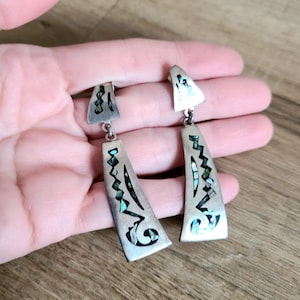 Large sterling silver statement dangling earrings with abalone shells. Designer jewelry.
