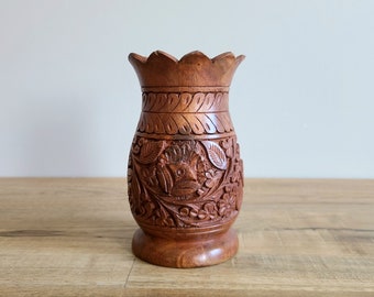 Vintage wooden carved vase with floral design. Dry flowers arrangement vase.