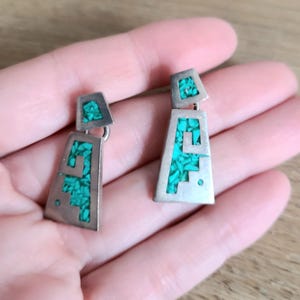 Sterling silver statement dangling earrings with Turquoise . Aztec design.