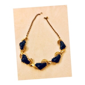 Vintage adjustable necklace of Five Cobalt Blue berry like lucite triangles with etched leaves