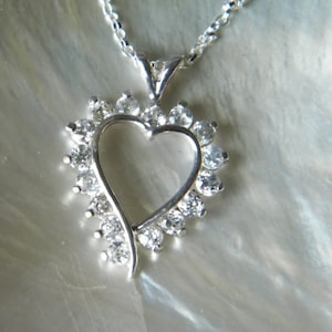 Handcrafted .925 Sterling Silver Heart Pendant with 16 pcs Natural Diamond Cut White Zircon gemstones