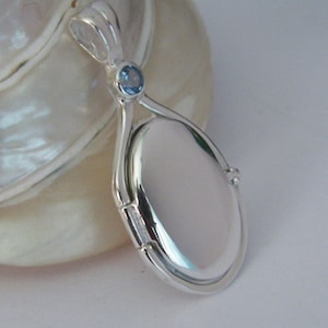 Hand Made in USA Bigger size 41 mm-20 mm Handcrafted 925 Sterling Silver H2O Just Add Water Mermaids 4 mm Lite Blue Cubic Zirconium Locket