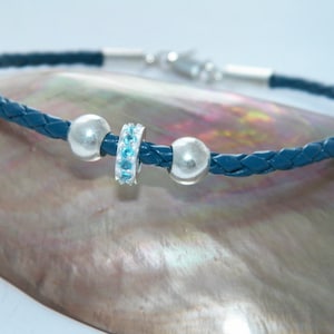 Handcrafted 3 mm Blue Bolo Braided Leather Cord Bracelet .925Sterling Silver Blue Cubic Zirconia Bead