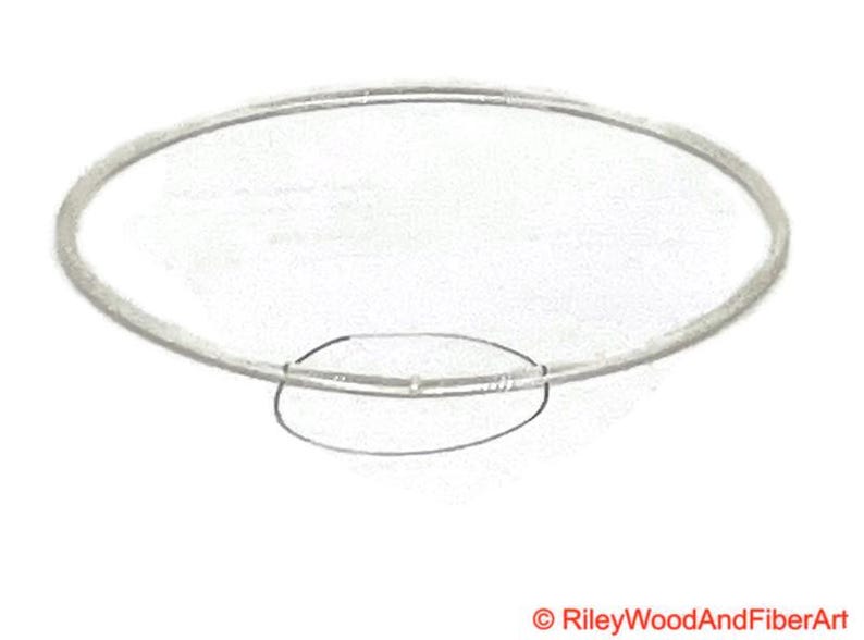 a piece of clear drive band material. it is joined and has a circle indicating where the join is.