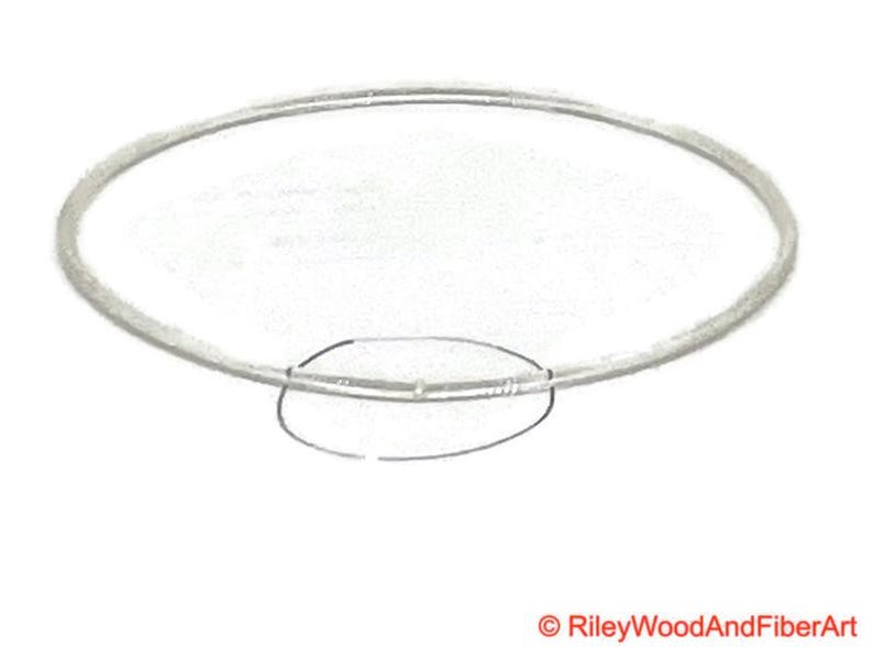 a piece of clear drive band material. it is joined and has a circle indicating where the join is.