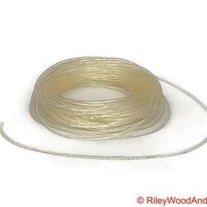 one eight clear polyurethane drive band material. It is a 100-foot roll coiled up forming kind of a large clear donut made of spaghetti.
