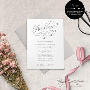 May include: A wedding invitation with a gray background and a white envelope. The invitation features a script font with the names "Andrea and Eric" at the top. The invitation includes the wedding date, time, and location. The text "Paper Tie Affair" is at the bottom of the invitation.