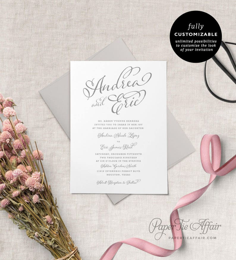 May include: A wedding invitation with a gray background and a white envelope. The invitation features a script font with the names "Andrea and Eric" at the top. The invitation includes the wedding date, time, and location. The text "Paper Tie Affair" is at the bottom of the invitation.