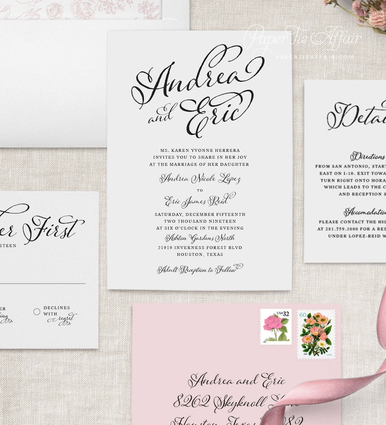 May include: Wedding invitation with a pink background and a white envelope. The invitation features a black script font with the names "Andrea and Eric" and the date "December Fifteenth, Two Thousand Nineteen". The invitation also includes the location "Ashton Gardens North" and the address "21919 Inverness Forest Blvd, Houston, Texas".