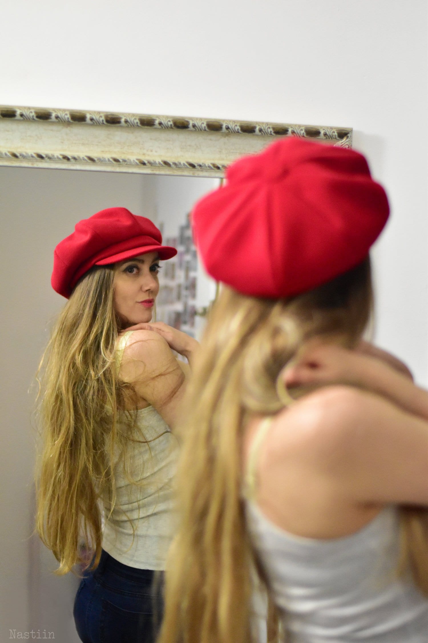 red newsboy hat