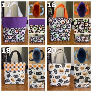 May include: Four Halloween-themed tote bags with different designs. The bags are made of fabric and have a top handle. The designs include eyeballs, pumpkins, cats, and owls. The bags are numbered 17, 18, 19, and 20.