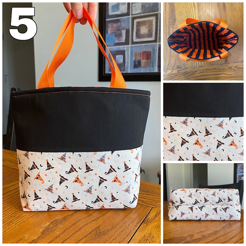 May include: A black and white tote bag with orange handles. The bag has a witch hat pattern on the bottom half and a solid black top half. The bag is shown from multiple angles, including the inside, which is lined with orange and black stripes.