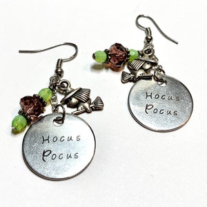 Witch on a broom earrings beaded dangles purple and green