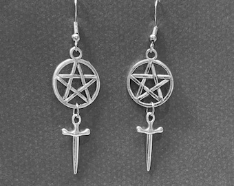 May include: Silver earrings with a pentagram charm and a sword charm hanging from each.