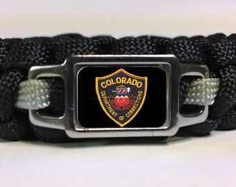 Thin Silver Line Colorado Department of Corrections CDOC Patch on Black Paracord Survival Bracelet