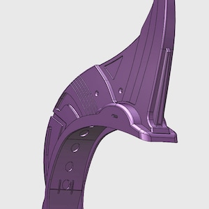 May include: A purple plastic 3D printed model of a futuristic helmet with a curved visor and a series of holes and ridges.