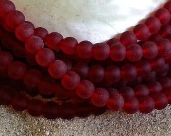 1 rang de perles de verre de la mer de culture rouge, percées au centre, rondes de 6 mm avec une finition mate - 32 pièces Par St.