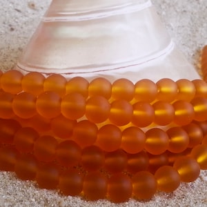 Sea Glass (Beach Glass) Beads -   Saffron   -  6mm Round Center Drilled Cultured Sea Glass Beads - 1 strand of approx. 32 beads