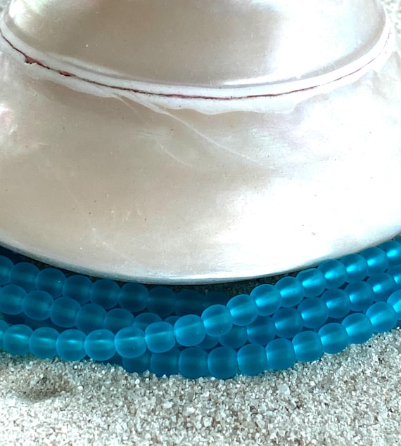 Matte Pacific Blue Aqua 4mm Round Center Drilled Sea Glass Beads With A 1mm hole - Approximately 50 Beads Per Strand