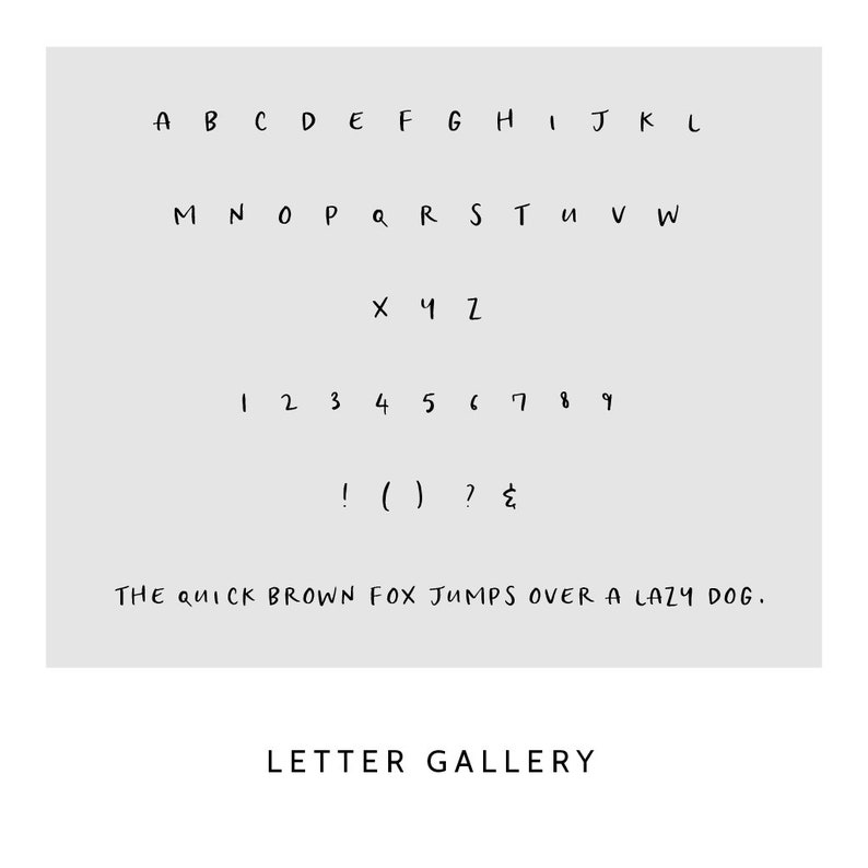 May include: A light gray graphic display featuring a complete set of uppercase letters from A to Z, numerals 1 through 9, and punctuation marks including an exclamation point, parentheses, question mark, and ampersand, with the text THE QUICK BROWN FOX JUMPS OVER A LAZY DOG and the words LETTER GALLERY.