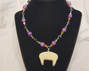 Collana fang vampiro verde e viola