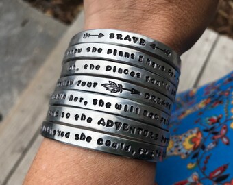 Graduation cuffs!  You choose the saying.