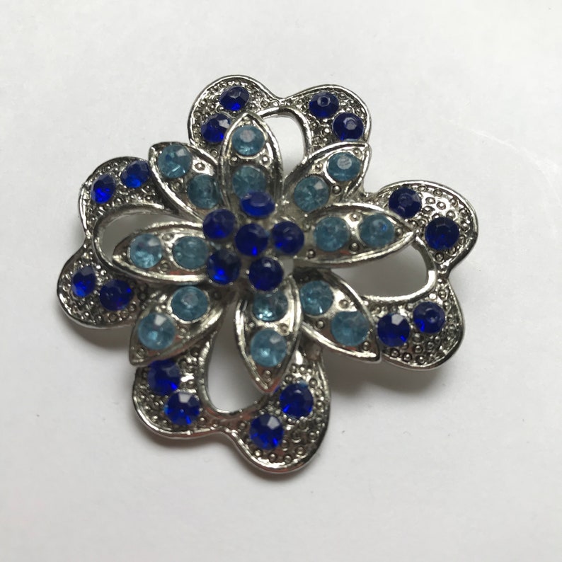 Vintage Silvertone Blue Rhinestone Flower Brooch