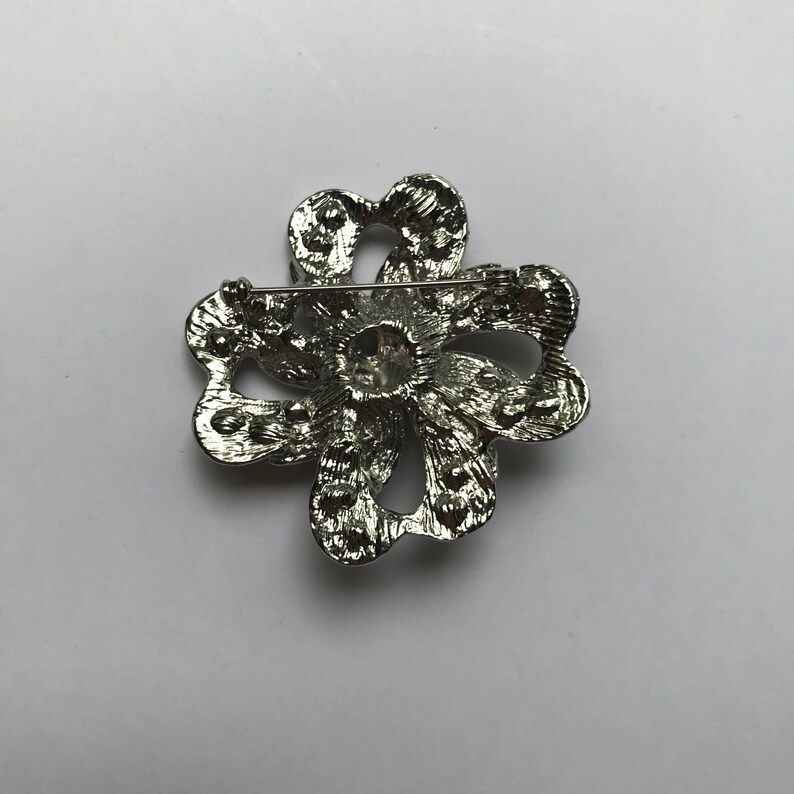 Vintage Silvertone Blue Rhinestone Flower Brooch